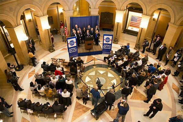 Second Chance Day in the Minnesota State Capitol rotunda, from above. Speaking is Secretary of State, Steve Simon.