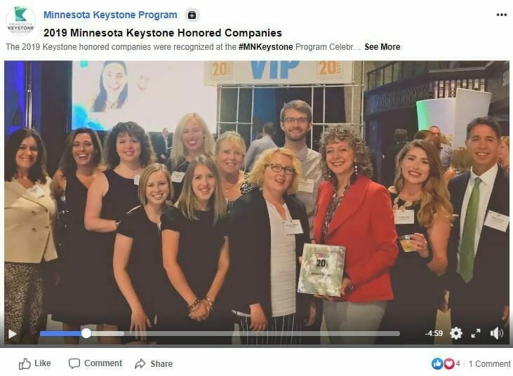 Advent Talent Group poses in this photo linking to a Facebook video about their MN Keystone Recognition