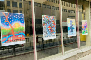 Image of art on the street on Hennepin Avenue from Avivo ArtWorks artists in partnership with the Hennepin Theatre Trust.