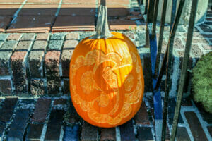 Pumpkin with Avivo CSP carved into it in fall 2021, at the Booyah Festival.