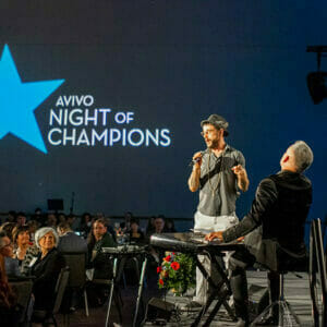 Harley Wood and George Mauer perform at Avivo Night of Champions event.
