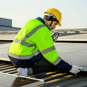 Image showing someone installing solar panels.
