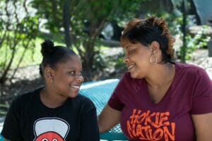 LaShonda and her daughter pose for a photo as part of LaShonda's recovery success story at Avivo.