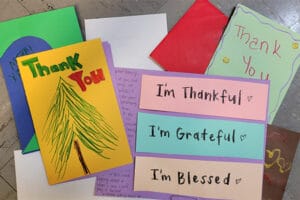 Image compilation of thank you cards sent by families who received Adopt-A-Family gifts from donors as part of Avivo's Adopt-A-Family program.