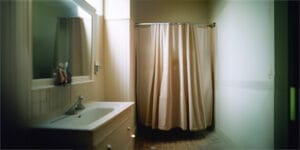 Image to promote Avivo's urgent needs kit of the month, shower kits, showing a shower in a bathroom.
